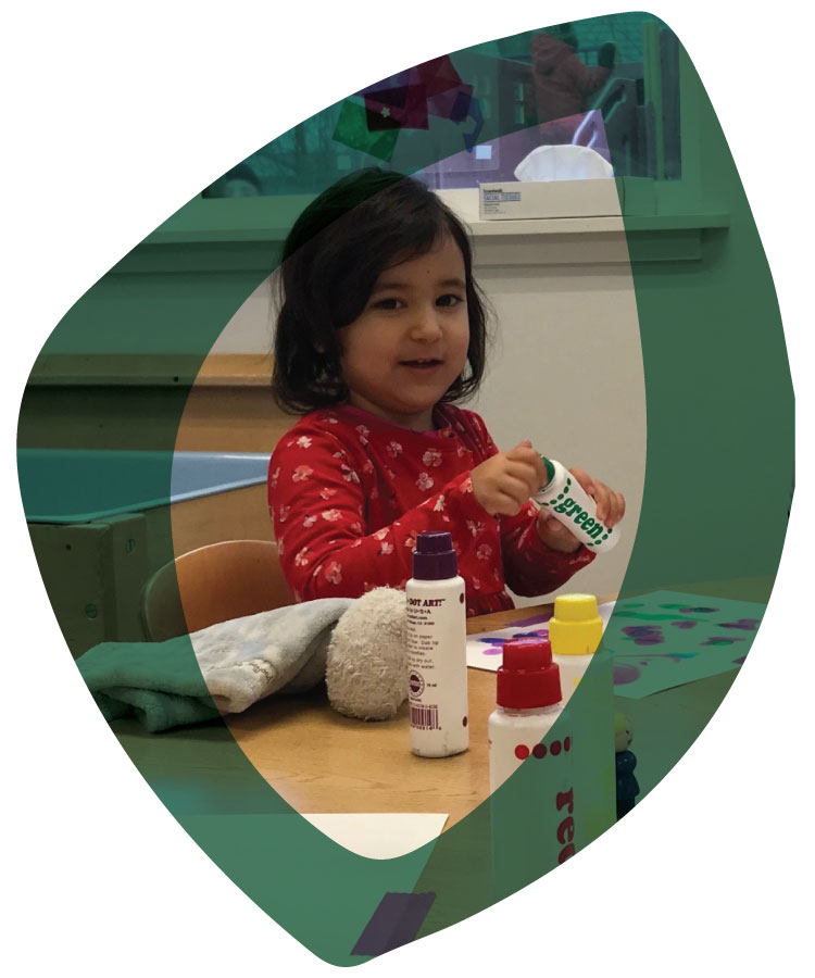 child dot painting at Allen Creek Preschool